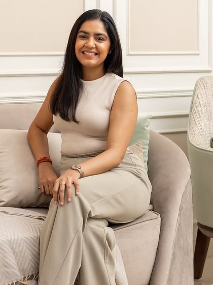 It was a pleasure working with my client Aakriti, seen here in her newly designed home. Seeing her joy as she steps into her dream space is the most rewarding part of what I do.