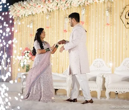 The couple on their reception stage, ready to begin their life together.