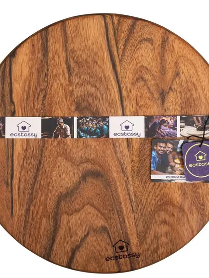 A simple, top-down product shot of an Ecstasy wooden serving board. This clean image focuses on the wood grain and the product's branding.
