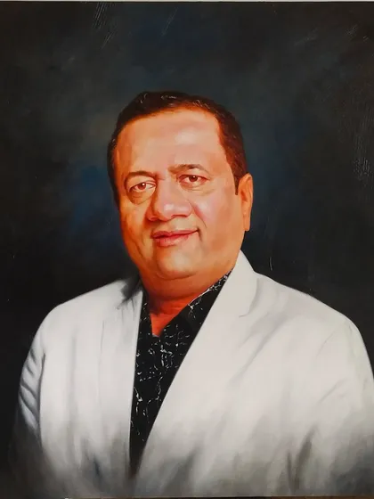 This is the final oil on canvas portrait I created for Mr. Dinesh Lakhani, the Global Director of Kiran Gems. It showcases my ability to deliver professional, formal portraits for corporate leaders, capturing a sense of presence and accomplishment.