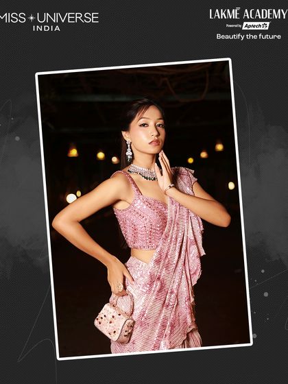 A beautiful contestant in a pink ruffled saree, showcasing the delicate and glamorous makeup skills of our students at the Miss Universe India 2025 Sufi Night.