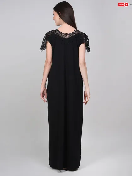 A back view of the nightgown, showcasing the lace detail on the shoulders and the overall cut from behind.