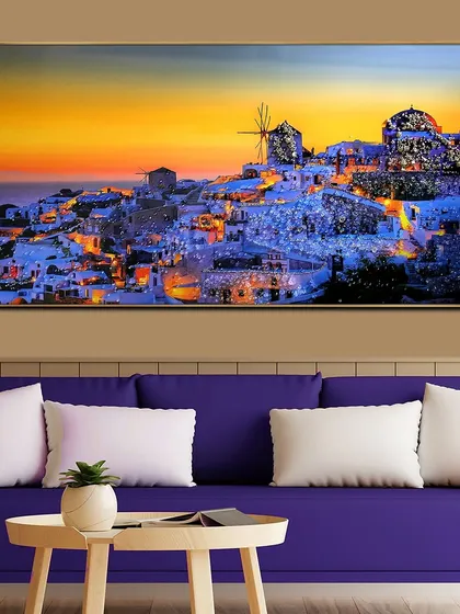 This crystal glass painting transports you to a Santorini sunset. The iconic white and blue buildings glow under a warm sky, with crystal details that make the scene sparkle with Mediterranean magic.