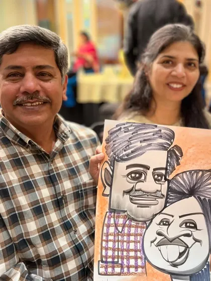 A couple from the Sheraton event, happy with their portrait.