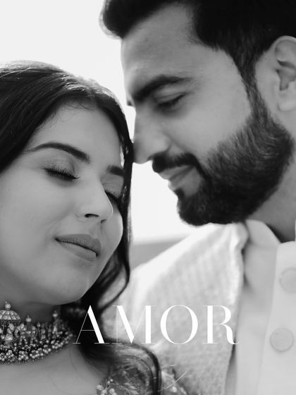 An intimate black and white close-up of the couple. Titled 'Amor', this photo beautifully captures the emotion and connection in their expressions.