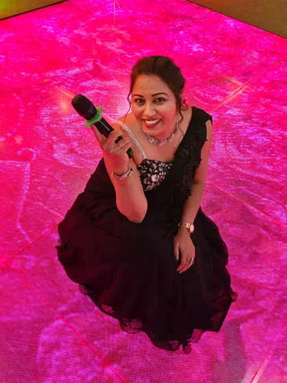 A fun, high-angle shot on the LED dance floor. I am not just a host on the stage; I am part of the celebration on the floor too.