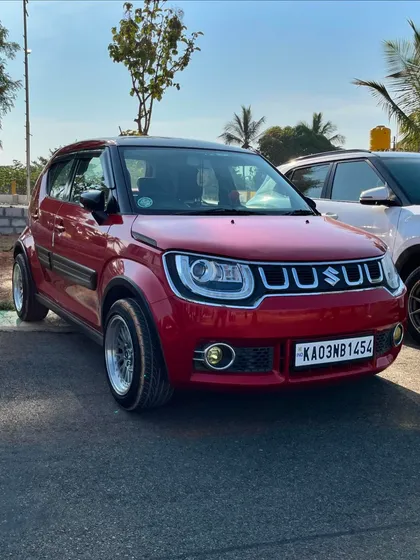 A modified red Suzuki Ignis looking sharp at the meetup. We welcome all types of cars, from stock to fully customized.