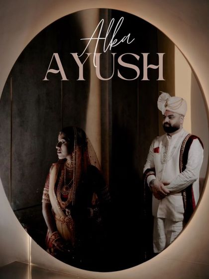 Another creative use of a mirror, this time a circular one, to frame the couple in a unique and artistic composition.