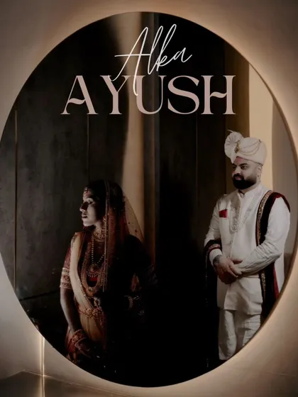 Another creative use of a mirror, this time a circular one, to frame the couple in a unique and artistic composition.