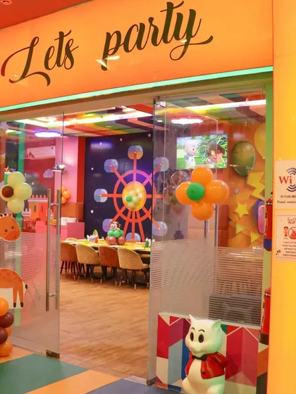The entrance to our private party area, clearly marked with "Let's party". This dedicated space ensures your celebration feels exclusive and special.