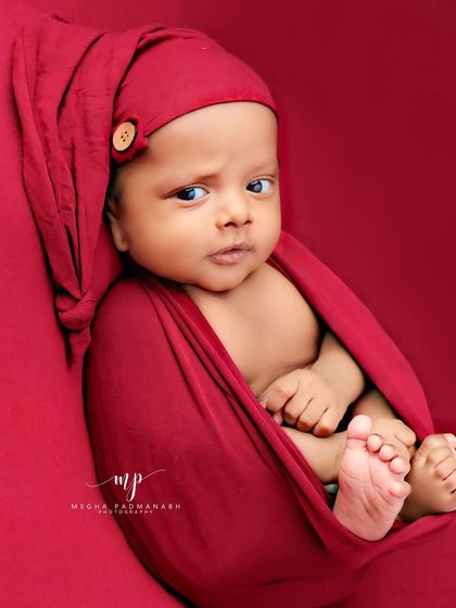 A slightly different look, with wide, inquisitive eyes. We patiently wait for these moments of connection.