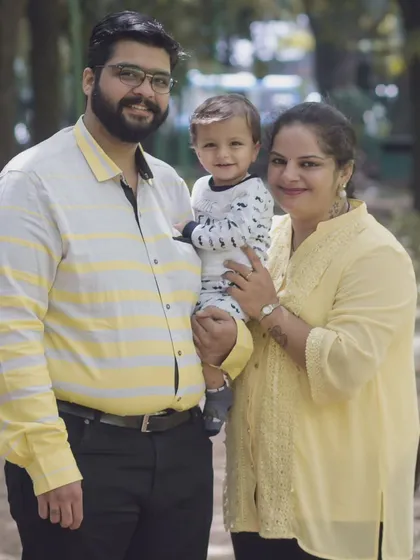 A classic family portrait taken outdoors. My approach is to make everyone feel relaxed, resulting in a photo that captures your family's warmth and personality, perfect for displaying in your home.