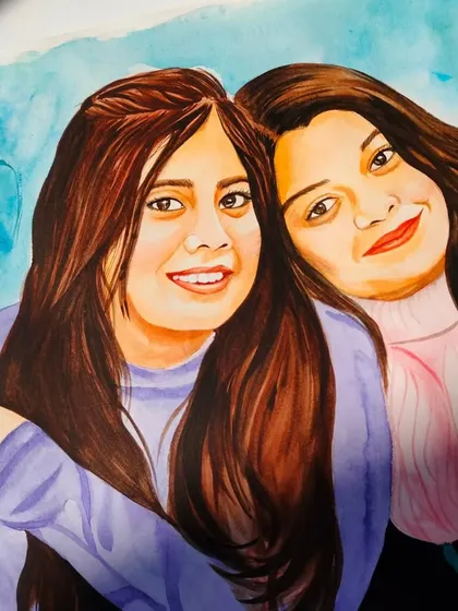 Another angle of the sisters' portrait, with the sunlight catching the texture of the watercolor paper and the vibrancy of the paints.