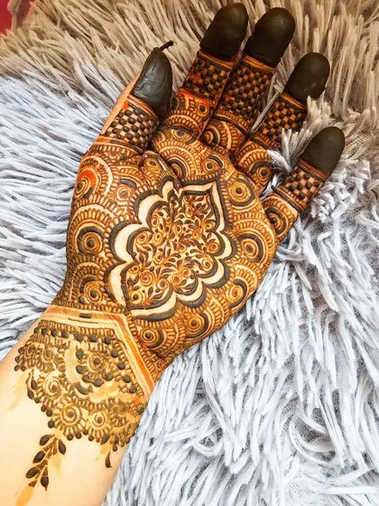 The stain of the intricate mandala, showing how the design darkens beautifully.