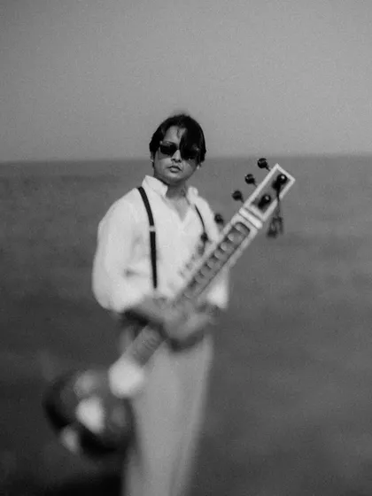 A blurry, artistic shot that captures the motion and energy of our "Strings of Serenity" project.