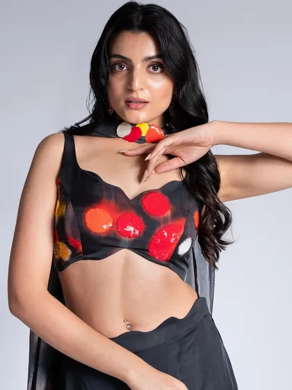 A creative look for Label Shivani Nirupam, with makeup that picks up the colors from the abstract-print top.