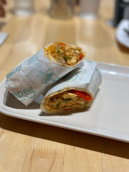 A satisfying meal on the go. Our paneer wrap is stuffed with flavorful fillings and is perfect for a quick lunch or a hearty snack.