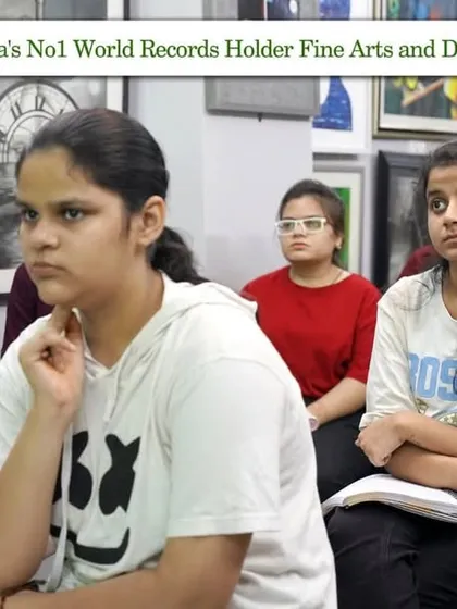 A close-up of our students, fully engaged and concentrating during a digital art history session. We believe focus is the key to learning.