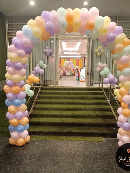 A duplicate image of the pastel balloon entrance arch, providing a clear and bright view of the decoration.