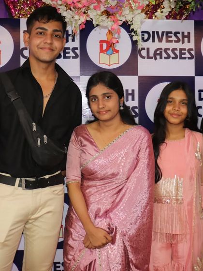 A teacher posing with students at the farewell party. These events are a great opportunity for informal interaction.