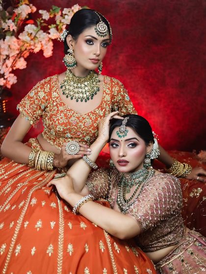 This photoshoot showcases two distinct but complementary bridal makeup looks. I used earthy tones and emerald green accents to create a cohesive and luxurious aesthetic, perfect for a high-fashion bridal editorial or for sisters getting ready together.