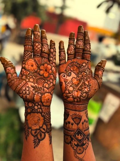 This unique design features a bride's portrait on one palm and intricate floral patterns on the other, offering a beautiful mix of figurative and abstract art.