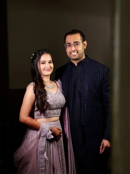 A classic couple portrait. Her soft glam look is perfect for their reception.