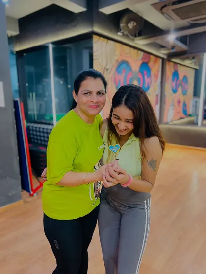 A sweet, candid moment with one of my students during the celebration. These connections are the heart of our class.