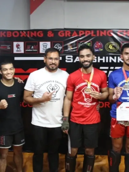 A group of our fighters and coaches celebrating their wins at the MFC Series 2.