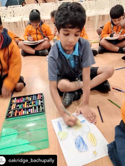 Another little artist at work, using oil pastels to create a colorful masterpiece. I love seeing what they come up with.