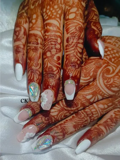 A different angle highlighting the dimension of the 3D flower and the holographic effect of the shattered glass nail.