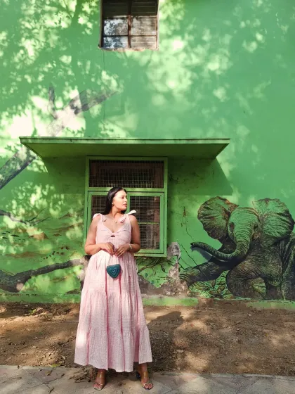 Another angle of this beautiful pink dress, showing how the right outfit can interact with its surroundings to create a perfect picture.