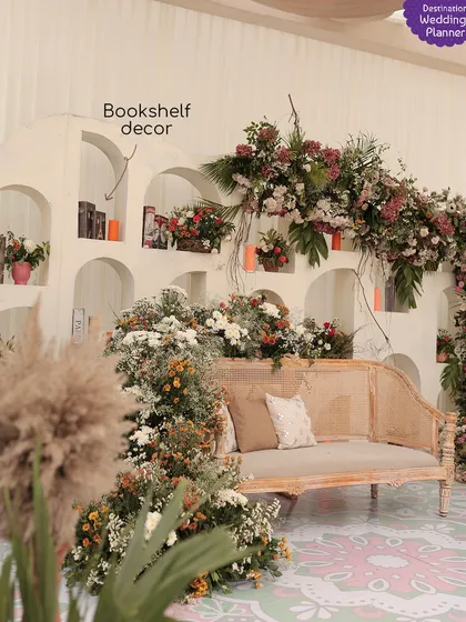 It's the personal details that tell your story. This bohemian-themed bookshelf backdrop was designed for a couple who are avid readers. I believe in decor that reflects who you are, not just a trend.