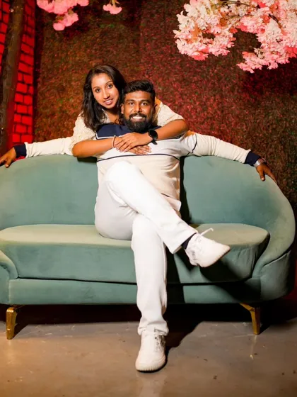 A cozy and intimate moment on a modern sofa. This indoor set is perfect for capturing relaxed and romantic photos.