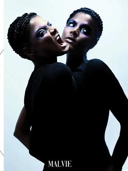 A surreal, two-faced portrait published in Malvie Magazine. This was achieved in-camera with creative posing and lighting to explore themes of duality and identity.