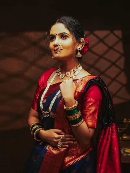 The play of light and shadow here adds a lot of drama and depth to this traditional portrait.