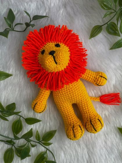 A vibrant version of the Lion King, Simba! This one has a bright yellow body and a fiery orange mane, making him look just like the character from the movie.