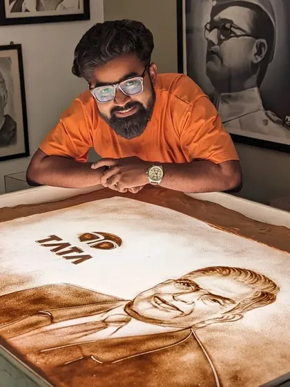 A tribute to the visionary Ratan Tata. Here I am with the finished sand art portrait, a small token of respect for a great leader.