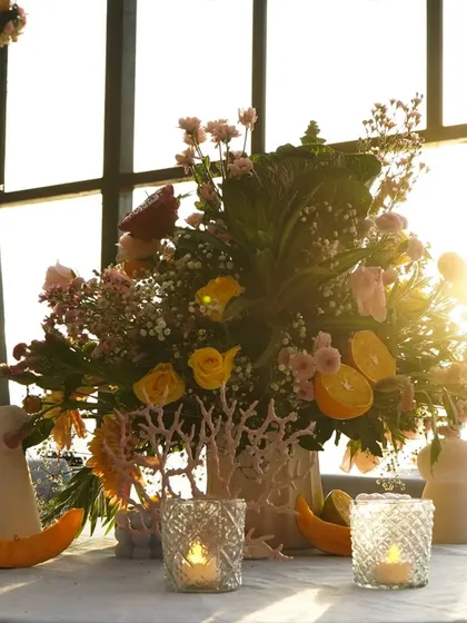 A floral arrangement catching the golden hour light, creating a magical, sun-kissed effect.