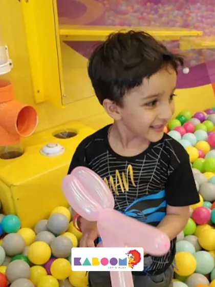 A balloon sword and a ball pit. The perfect combination for an imaginative adventure.