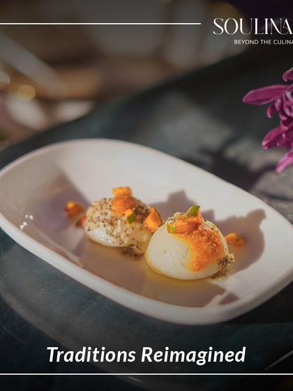 Traditions reimagined. This dish presents a modern interpretation of a classic, with two delicate spheres of flavour, showcasing our innovative culinary approach.