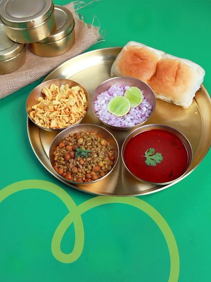 Who says tiffin has to be just dal and sabzi? Sometimes we switch it up with Mumbai street food classics like Misal Pav, served with all the fixings.