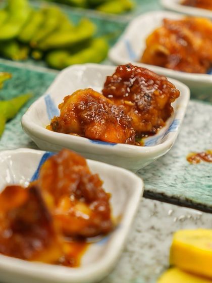 A close-up of the teriyaki shrimp from our Sanmi no Kyouen appetizer. The shrimp are coated in a sweet and savory glaze, making them incredibly flavorful.