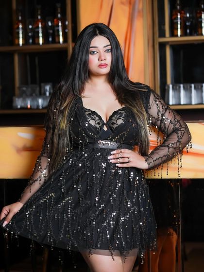 Another portrait in the same outfit, showcasing a confident pose that's perfect for social media or lookbooks.