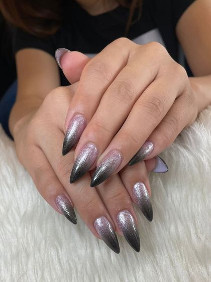 The full stiletto set of ombré glitter nails, perfect for a night out.