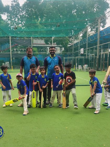 Our coaches stand proudly with a group of our youngest cricketers. We believe in providing expert guidance and encouragement to nurture their talent and love for the game right from the start.