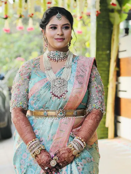 Another portrait of the same stunning bride, her elegance and beauty are captivating.