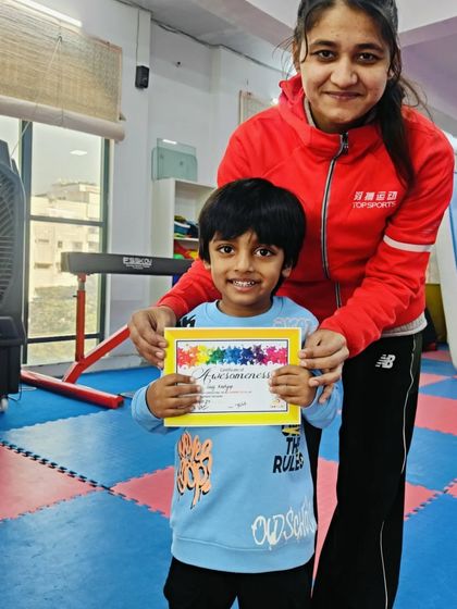 A big smile from this young boy who just earned his "Awesomeness" certificate.