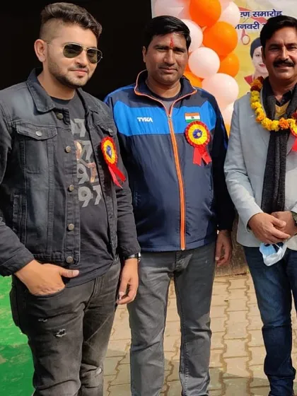 Our coach with an Arjuna Awardee and other dignitaries at a shooting event. We are proud to be connected with the legends of the sport.