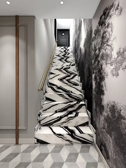 This waiting area for a lawyer's office in South Delhi makes a bold statement with its dramatic Panda marble staircase and 3D geometric flooring. The design is contemporary and visually striking, creating a memorable first impression for visitors.